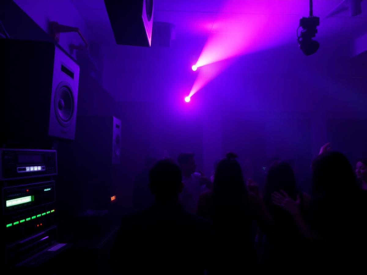 Late night dance club with audiophile speakers and purple lighting